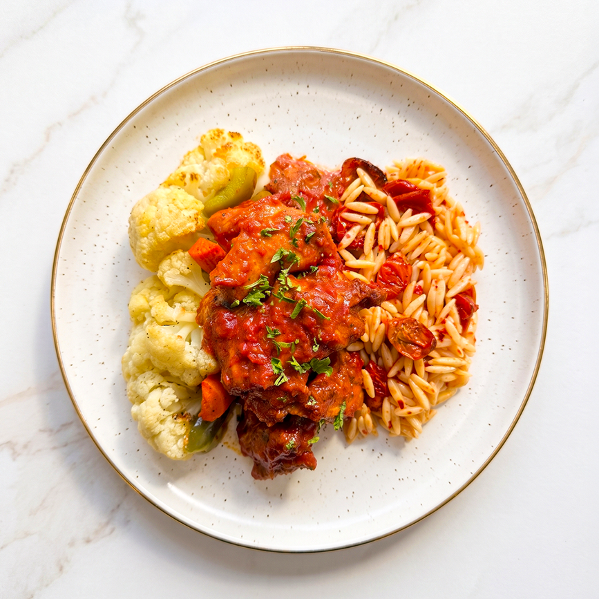 Harissa Chicken with Green Capsicums, Cauliflower, Carrots and Sun-Dried Orzo Aglio Olio