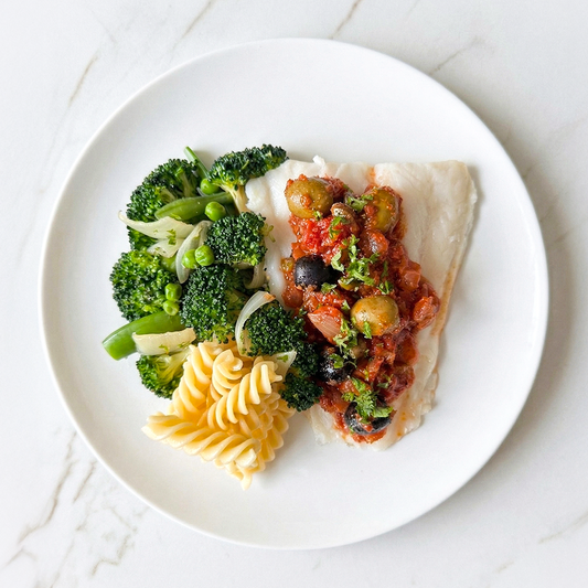 Roasted Fish in Puttanesca Sauce with Green Vegetable and Fusili Pasta