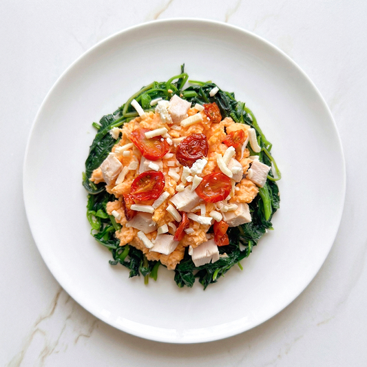 Scrambled Eggs with Chicken, Creamed Spinach and Oven Dried Cherry Tomatoes